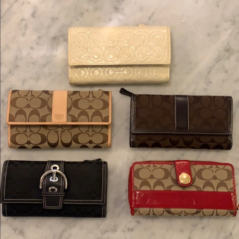 Coach clutch wallets